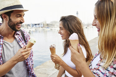 Three happy friends holding ice cream cones - JRFF01460