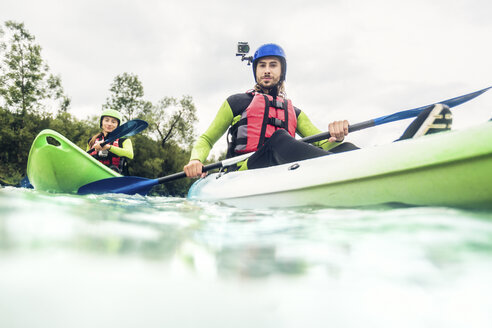 Germany, Bavaria, Allgaeu, couple kayaking on river Iller - PNPF00065