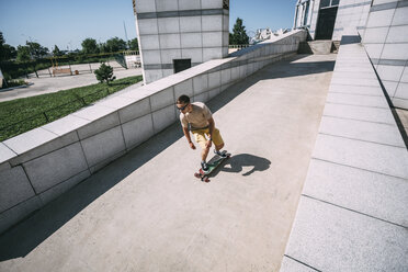 Young man riding skateboard in the city - VPIF00210