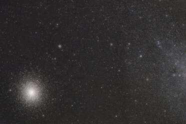 Namibia, Region Khomas, near Uhlenhorst, Astrophoto of the globular cluster 47 Tuc (NGC 104) and its neighbor spiral galaxy Small Magellanic Cloud (SMC, NGC 292) with a telescope - THGF00022