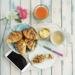 Breakfast with chocolate croissants and smartphone - ECF01911