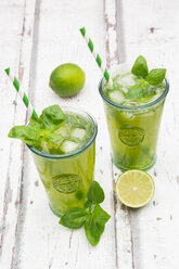 Two glasses of organic lime lemonade with basil - LVF06335