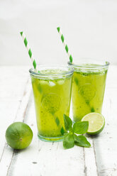 Two glasses of organic lime lemonade with basil - LVF06337