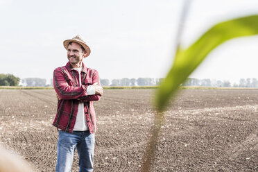 Portrait of confident farmer on field - UUF11911