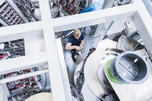 Top view of man working in modern factory - DIGF02951