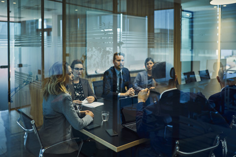 Group of business people discussing in meeting stock photo