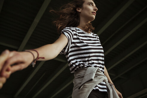 Young woman balancing under a bridge - FEXF00289