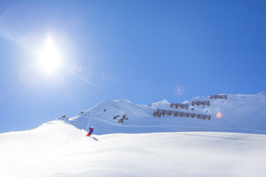 Austria, Bludenz, skier in powder snow - MMAF00167