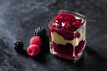 red fruit compote with vanilla sauce layered in a glass - CSF28387