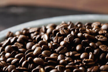 Freshly roasted coffee beans in a bowl - CSF28410