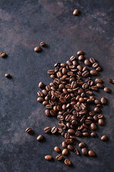 Freshly roasted coffee beans on dark background - CSF28411