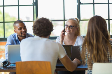 Young business people in office preparing foundation of a start-up company - SPCF00233