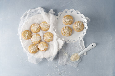 Biscuits with sugar icing and coconut flakes - MYF01979