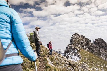 Germany, Bavaria, Oberstdorf, hikers in alpine scenery - UUF12122