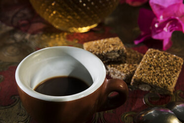 Cup of espresso and sesame almond brittle - CSTF01429