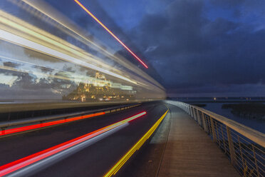 France, Normandy, Light trails, lighted Mont Saint-Michel in the background - RPSF00002