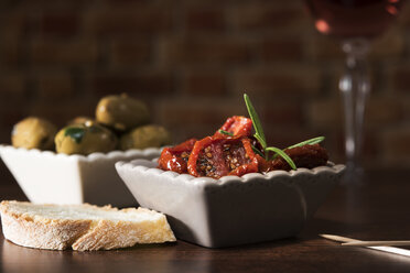 Antipasti, pickled olives, pickled tried tomato, olive bread - CSTF01454