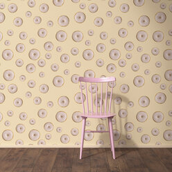 Wallpaper with doughnut pattern, single chair and wooden floor, 3D Rendering - UWF01305