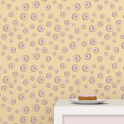 Plate with doughnut on cup board in front of wallpaper with doughnut pattern, 3D Rendering - UWF01306