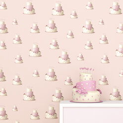 Pink and white birthday cake in front of wallpaper with fancy cake pattern, 3D Rendering - UWF01315