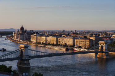 Hungary, Budapest, cityscape at sunset with Chain Bridge on Danube River - ABOF00317