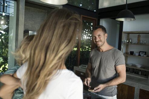 Happy family in comfortable kitchen - SBOF00891