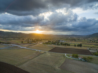 Italy, Umbria, Gubbio, Aerial view of fields in the countryside in Autumn - LOMF00670