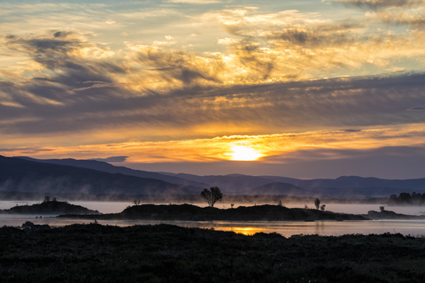 Great Britain, Scotland, Scottish Highlands, Glencoe, Rannoch Moor, Sunrise over Loch Ba stock photo
