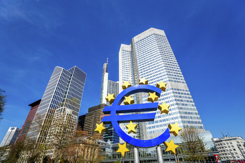 Germany, Frankfurt, Euro symbol and skyscrapers of European Central Bank in the background - PUF00910
