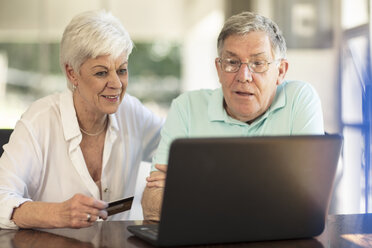 Senior couple shopping online with credit card - ZEF14743