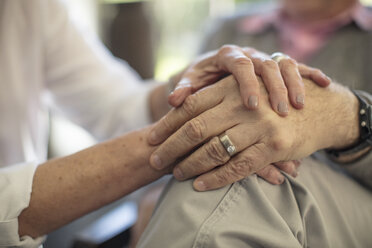 Close-up of senior couple holding hands - ZEF14769