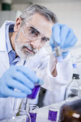 Scientist in lab working with liquid - WESTF23745