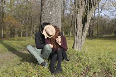 Affectionate couple in the forest in autumn - FCF01317