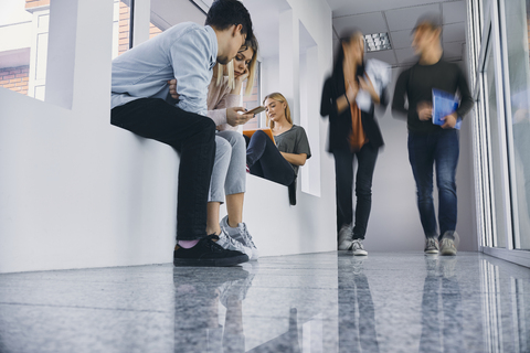 Group of students in hallway stock photo