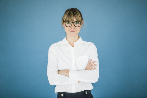 Portrait of smiling businesswoman with glasses stock photo