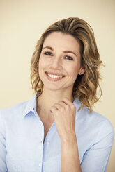 Portrait of blond woman, smiling, business woman, light blue blouse - PNEF00361