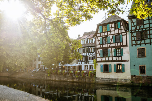 France, Strasbourg, half-timbered houses at river III at sunset - KIJF01728