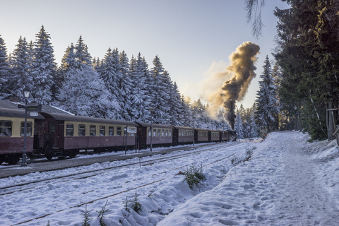 Germany, Saxony-Anhalt, Schierke, Harz National Park, Schierke Station, Brocken Railway at winter evening stock photo