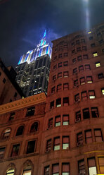 USA, New York, High-rise buildings and Empire State Building at night - HLF01066