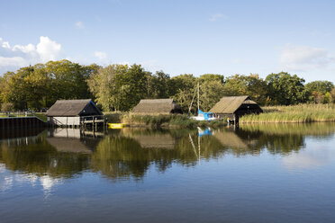 Germany, Fischland-Darss-Zingst, Prerow, Prerowstrom, boat houses - WIF03471