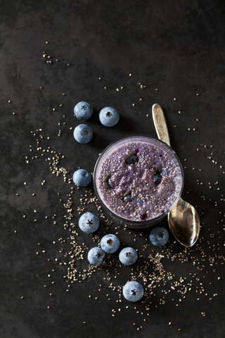 Dessert of chia seeds, cacao nibs and blueberries stock photo