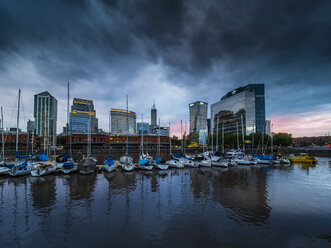 Argentina, Buenos Aires, Puerto Madero, Dock Sud with Catalinas Towers, financial district, Retiro at night - AMF05569