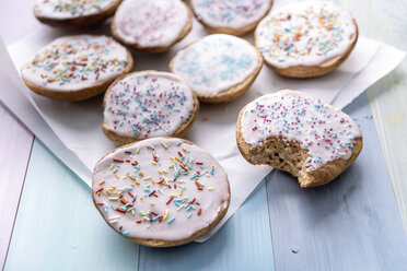 Vegan sweet pastry with sugar icing and coloured sugar beads and granules - IPF00434