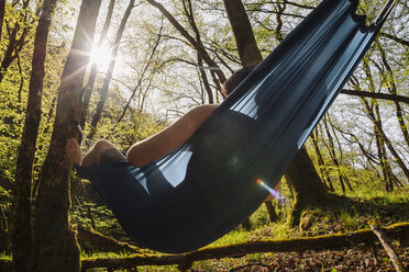 Young man lying in hammock - GUSF00267