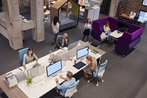 People working in big modern office stock photo