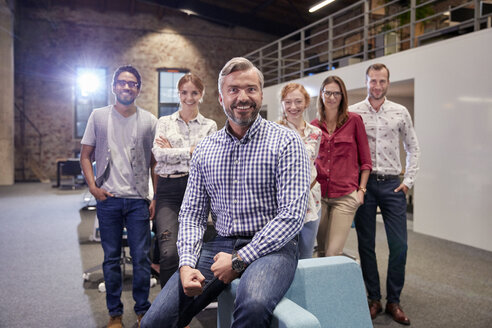 Group portrait of a team of colleagues working for a start up company - WESTF23904