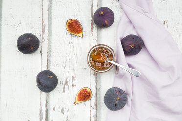 Organic figs and a glass of fig jam on a wood - LVF06526