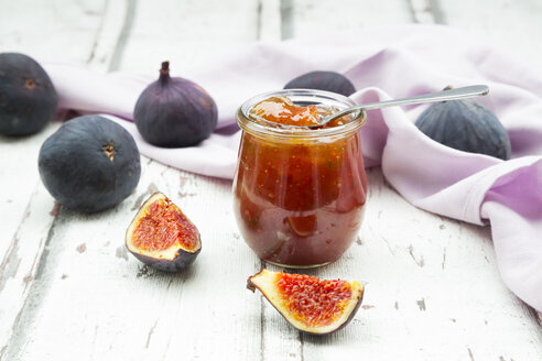 Organic figs and a glass of fig jam on a wood - LVF06527