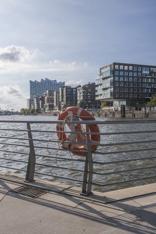 Germany, Hamburg, Grasbrook Harbour, lifesaver in the foreground stock photo