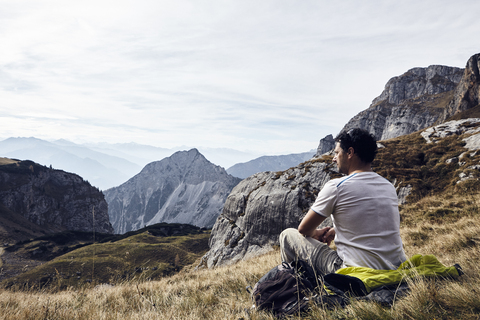 Austria, Tyrol, Rofan Mountains, hiker taking a break stock photo